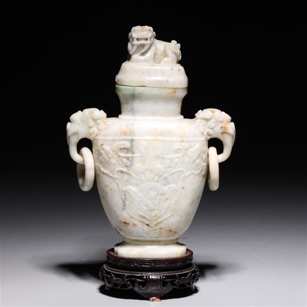 Appraisal: Chinese hardstone vase with loose rings and foo lion finial