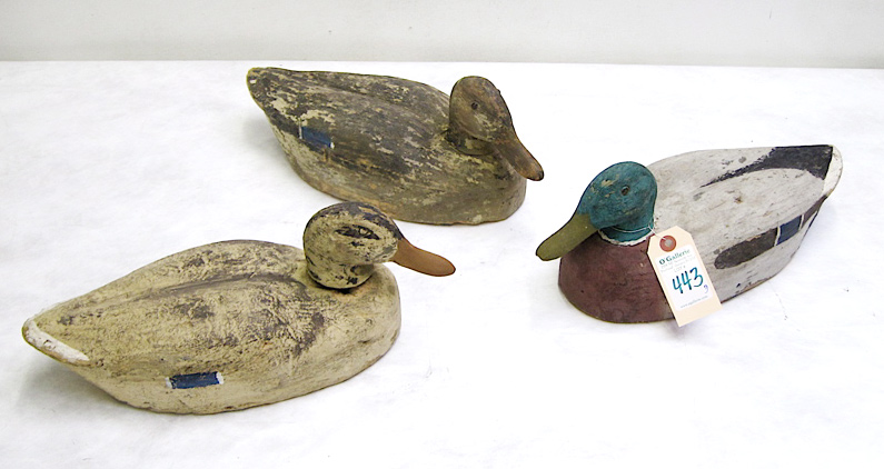 Appraisal: THREE PAINTED WOOD DUCK DECOYS American early th century a