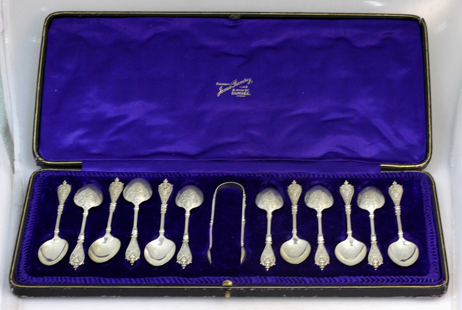 Appraisal: A set of twelve silver teaspoons and the matching tongs