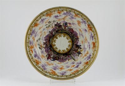 Appraisal: A large Continental porcelain plate later decorated with a circular