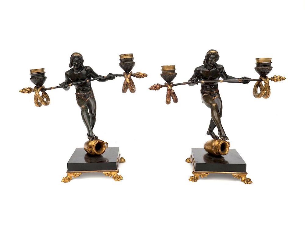 Appraisal: A Pair of Carriere-Belleuse Bronze and Gilt Bronze Candelabra Height