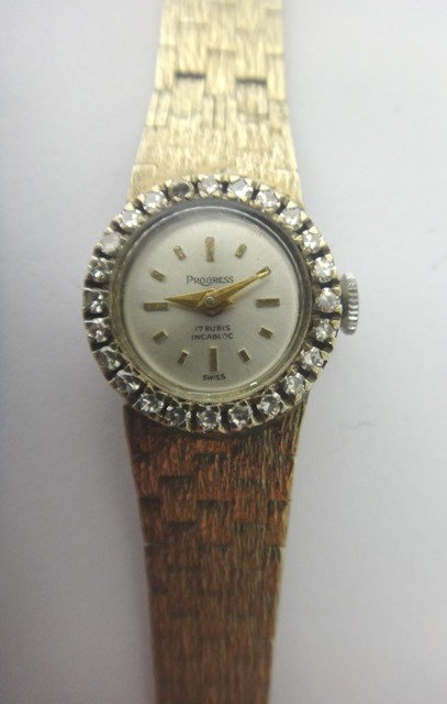 Appraisal: A lady's white gold and diamond set Progress bracelet wristwatch