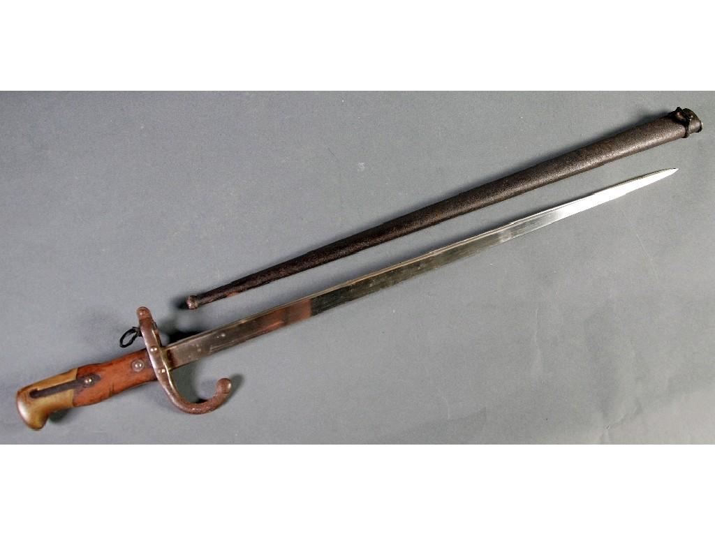 Appraisal: A ST ETIENNE FRENCH BAYONET IN SCABBARDEST -