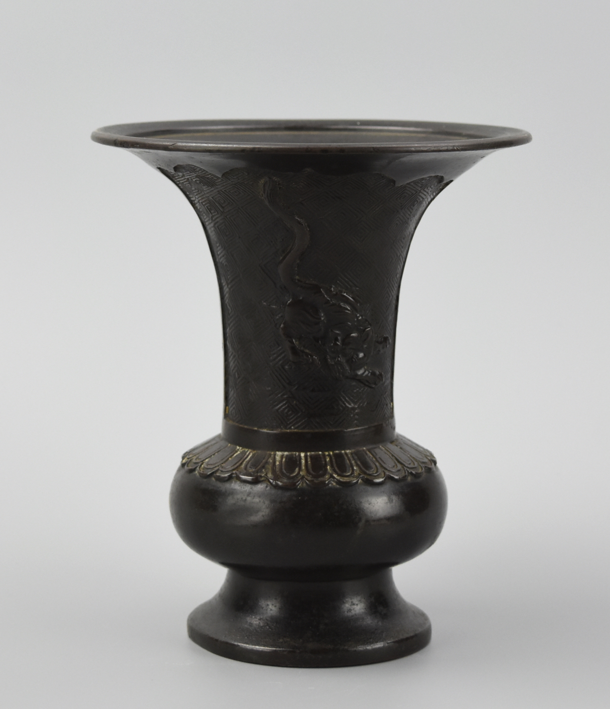 Appraisal: CHINESE BRONZE GU VASE W FIGURES TIGER TH C This