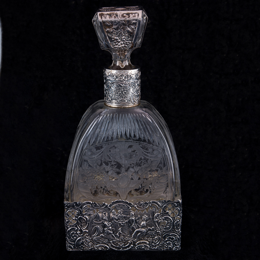 Appraisal: A CONTINENTAL ETCHED GLASS DECANTER FASHIONED IN THE ROCOCO REVIVAL