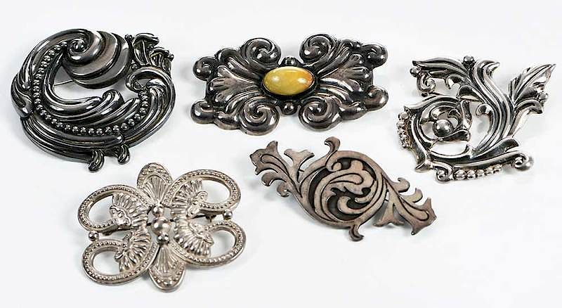 Appraisal: Five Sterling Brooches leafy designs one with oval yellow cabochon