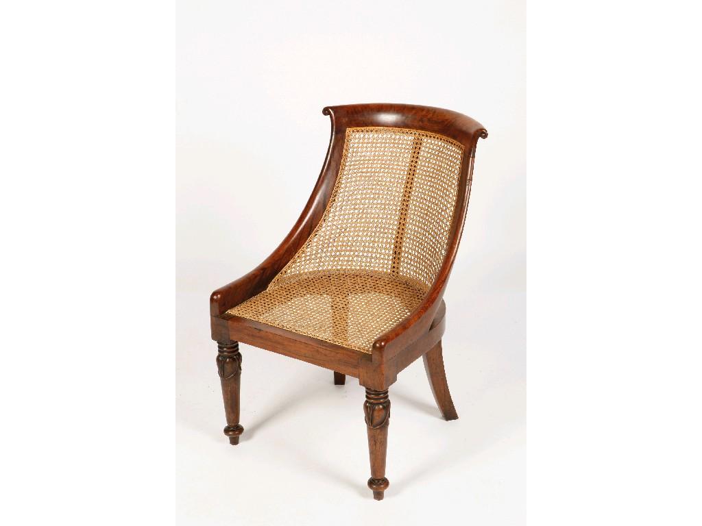 Appraisal: A ROSEWOOD EFFECT REGENCY SLIPPER CHAIR in the manner of