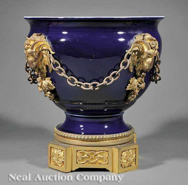 Appraisal: A Louis XVI-Style Cobalt Porcelain and Gilt Bronze Urn late