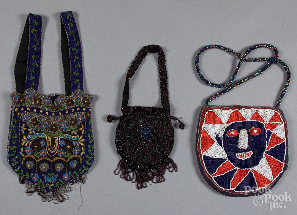 Appraisal: Two beaded purses together with a dress medallio Two beaded