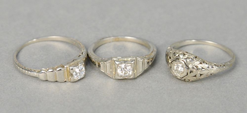 Appraisal: Three karat white gold rings set with diamonds grams total