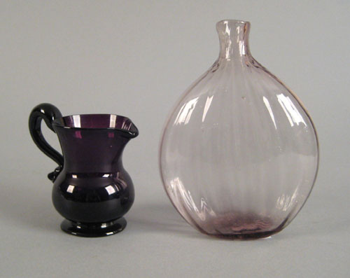 Appraisal: Pale amethyst glass eighteen rib midwestern pocket flask h together