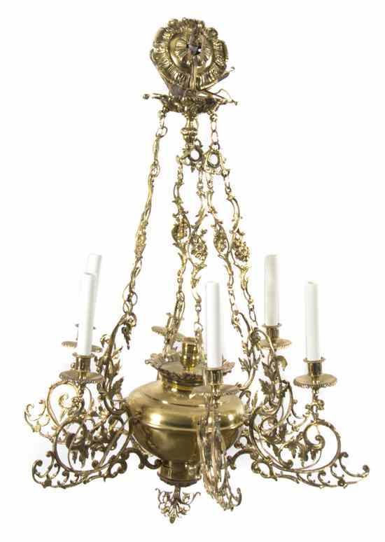 Appraisal: A Victorian Style Brass Six-Light Chandelier having a canister form