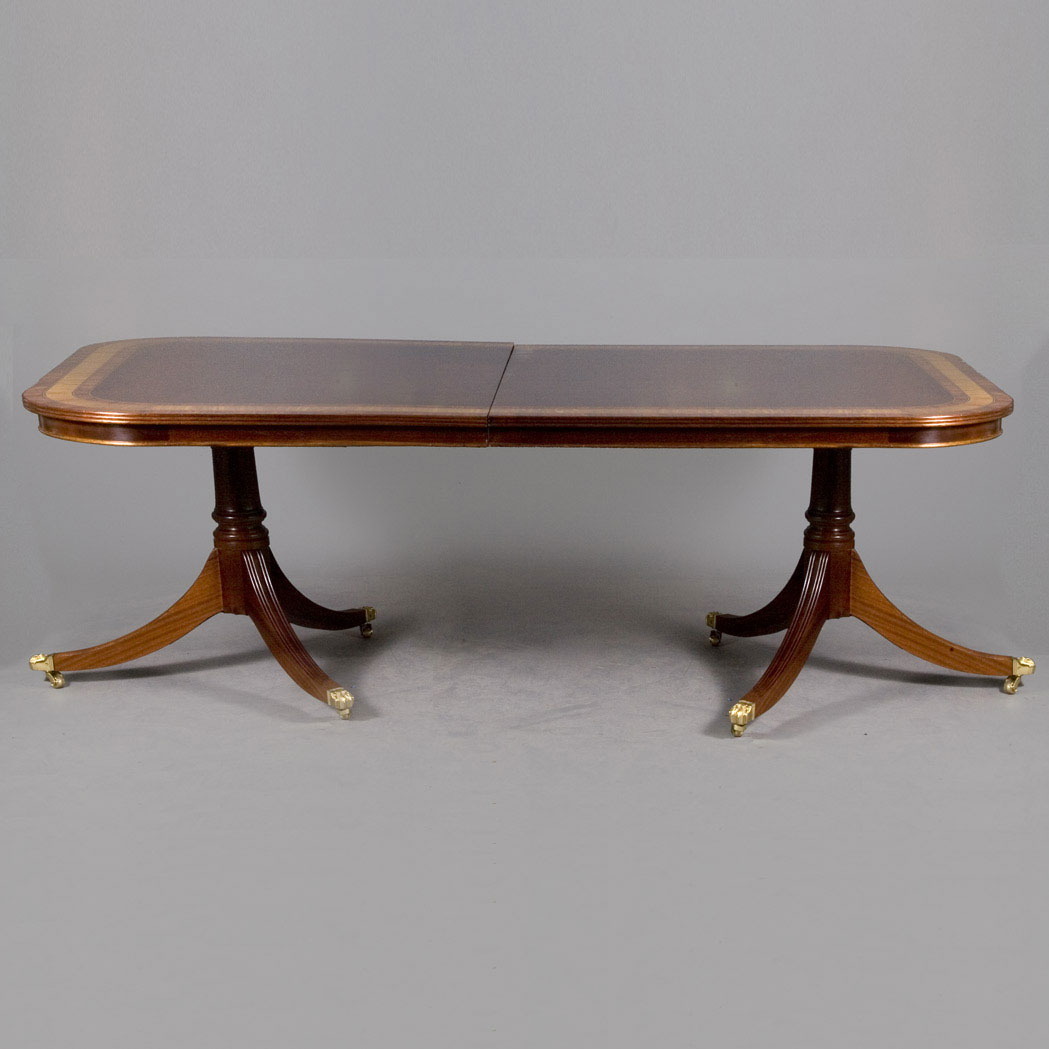 Appraisal: George III Style Banded Mahogany Double-Pedestal Dining Table With two