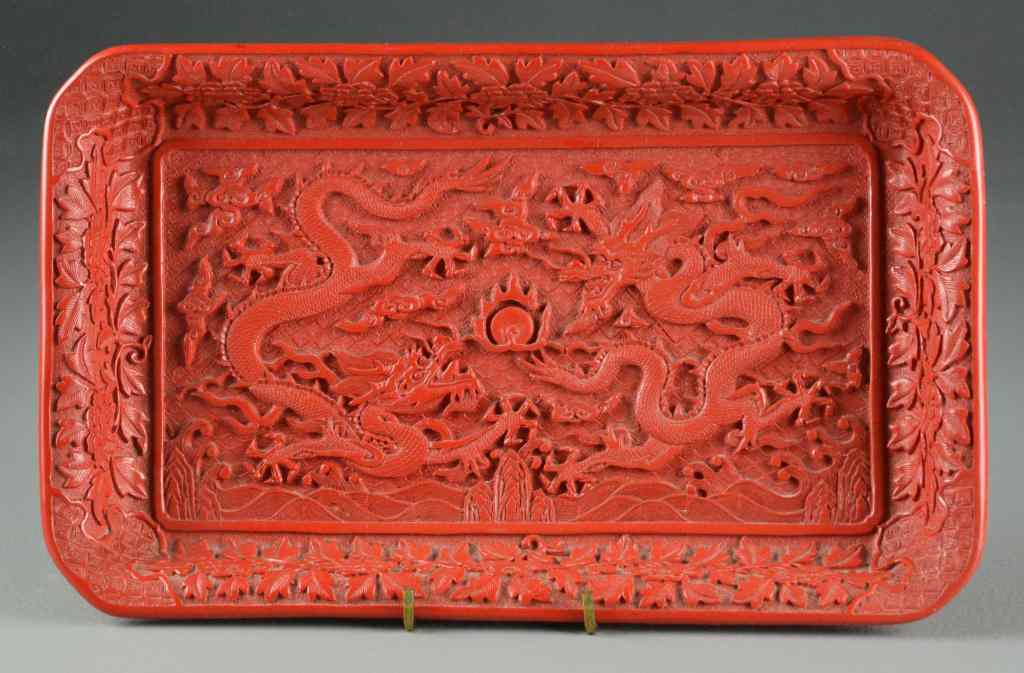 Appraisal: Chinese Cinnabar Dragon TrayA finely carved rectangular tray depicting two