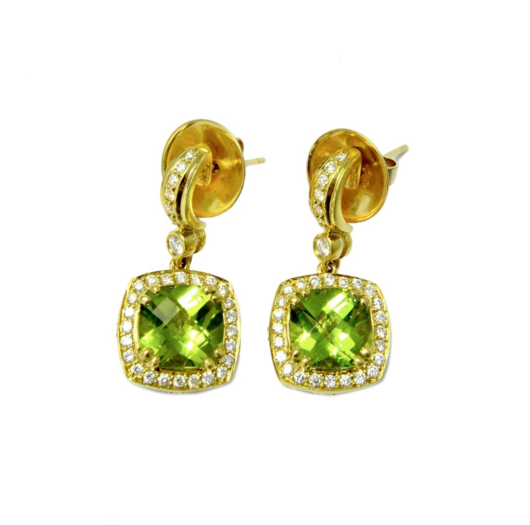 Appraisal: A pair of gold peridot and diamond set pendant earrings