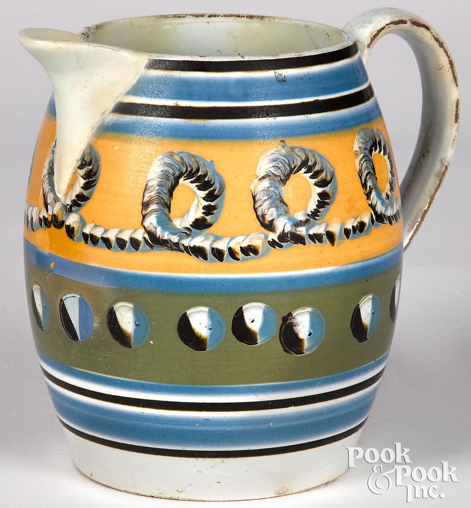 Appraisal: Mocha pitcher Mocha pitcher with earthworm and cat's-eye decoration h