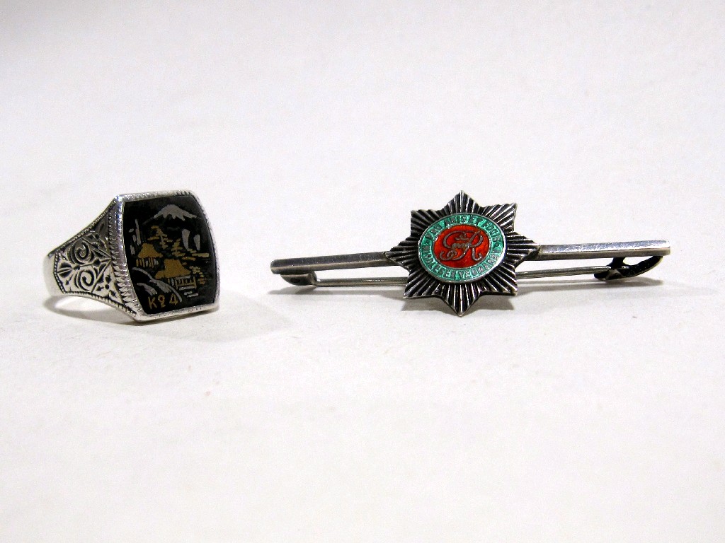 Appraisal: Lot comprising military silver tie pin and a silver dress