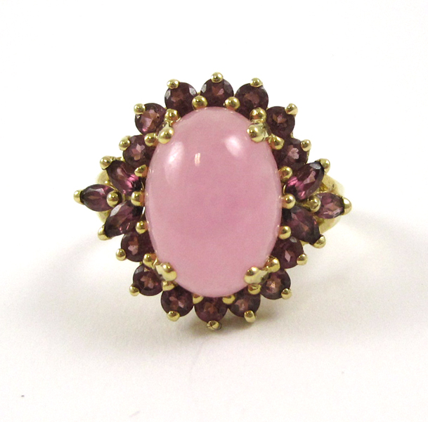 Appraisal: ROSE QUARTZ AND PINK TOURMALINE RING k yellow gold with