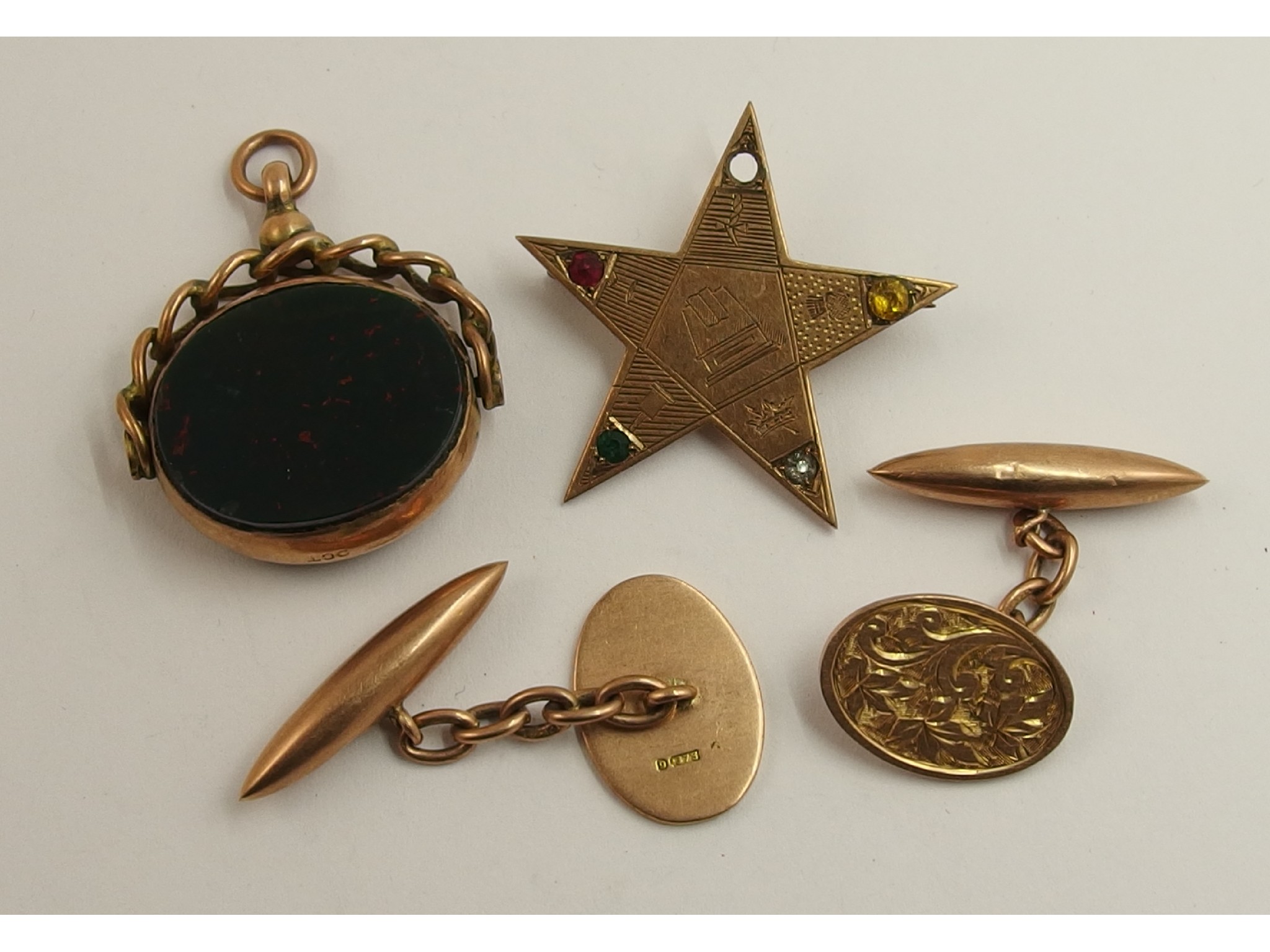 Appraisal: A ct Masonic Star brooch ct cufflinks and a fob