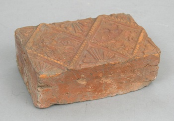 Appraisal: A German Tile ca th Century A red earthenware tile