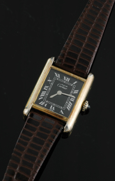 Appraisal: A Ladies Cartier Tank wristwatch Quartz rectangular black dial with