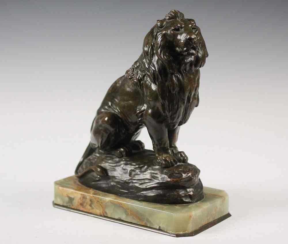 Appraisal: BRONZE SCULPTURE - Bronze sculpture of a seated lion by