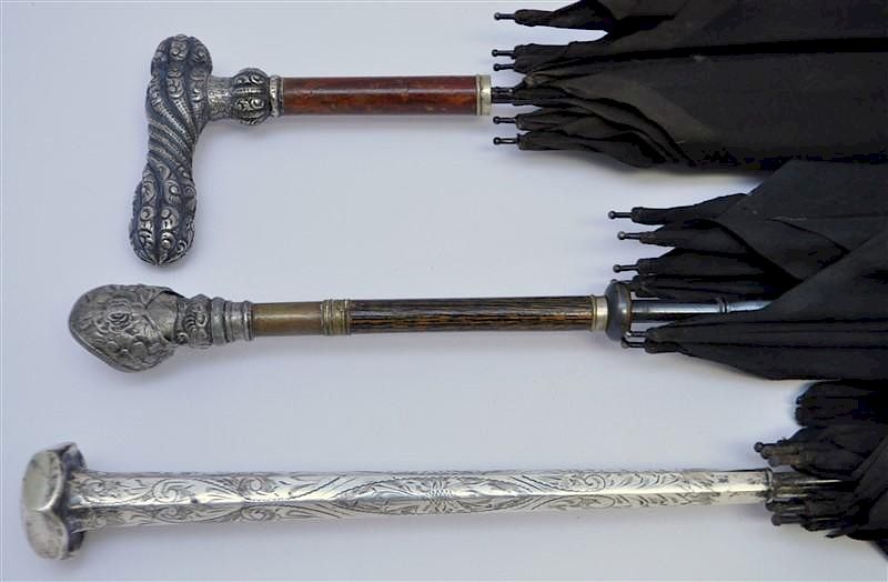 Appraisal: STERLING SILVER HANDLE UMBRELLAS Three Silver Handled Umbrellas Two are