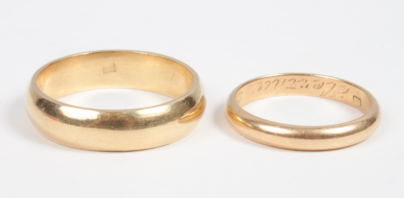 Appraisal: Two K gold wedding bands mm mm wide sizes grams