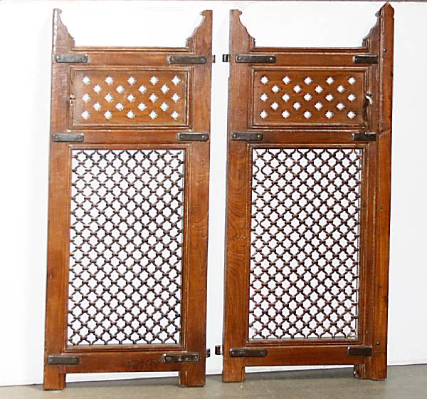 Appraisal: A pair of Spanish olivewood gates circa height in width