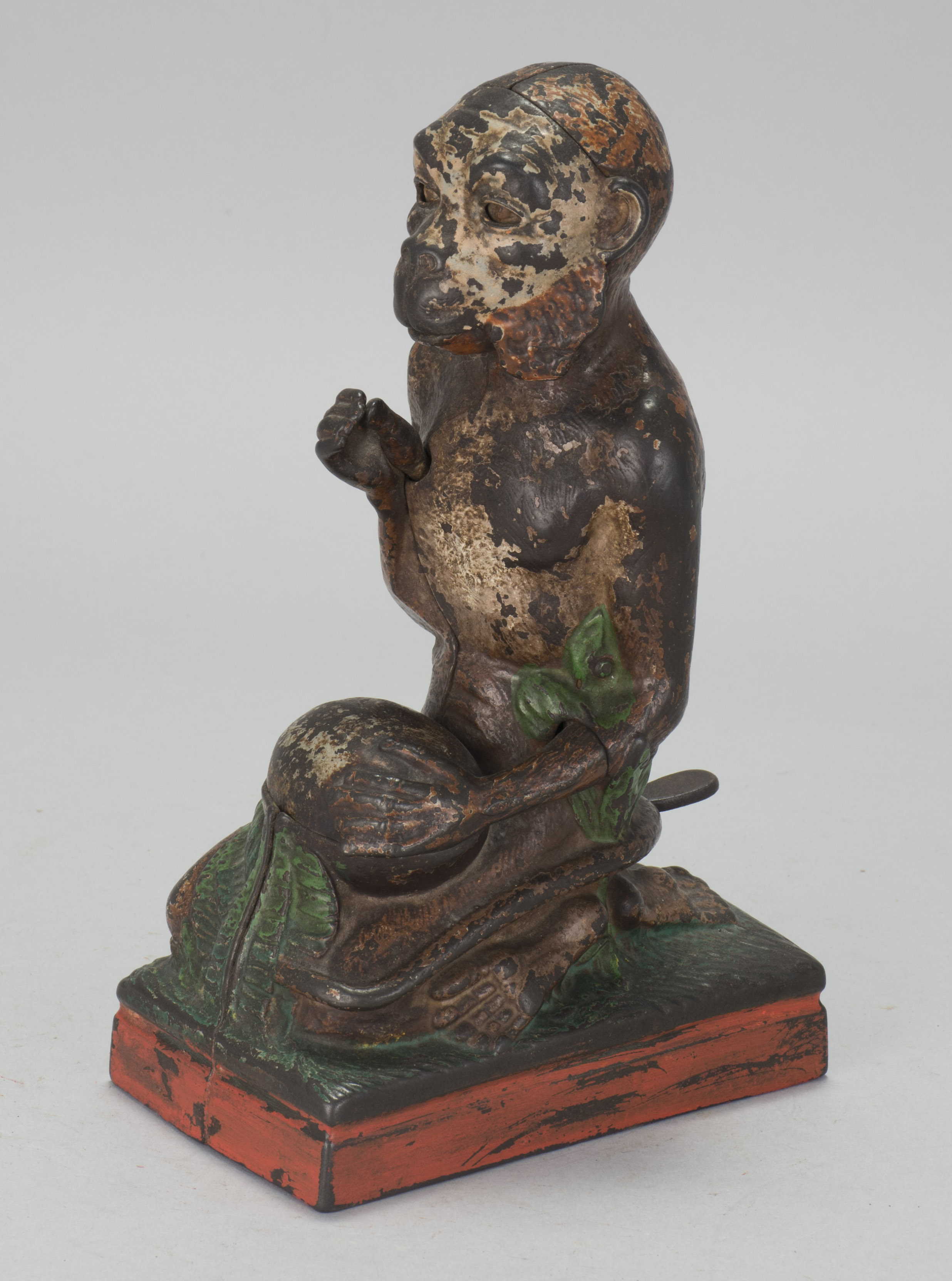 Appraisal: MONKEY IN COCONUT CAST IRON MECHANICAL BANK Patented By J