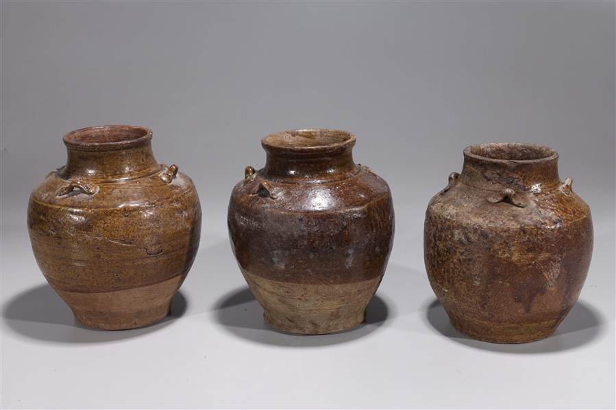 Appraisal: Group of three antique Chinese Yuan dynasty glazed ceramic jars