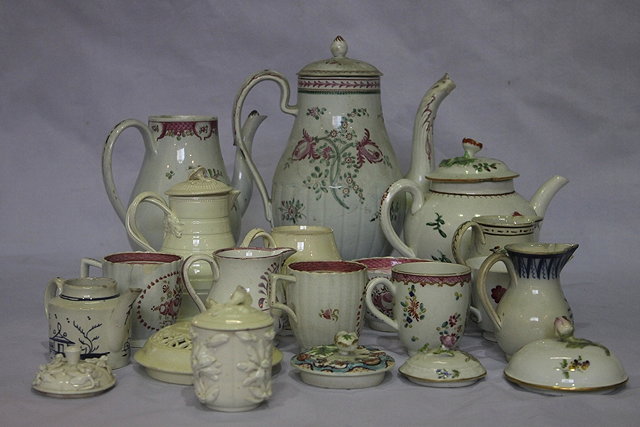 Appraisal: A COLLECTION OF ENGLISH CREAMWARE a few cream jugs a