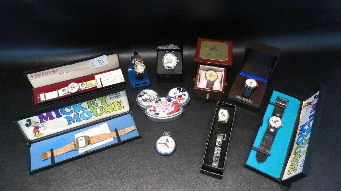 Appraisal: TEN COLLECTIBLE DISNEY WATCHES including th year anniversary Lorus Goofy