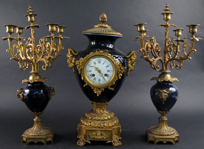 Appraisal: FRENCH THREE-PIECE FRENCH CLOCK SET cobalt blue Sevres porcelain in