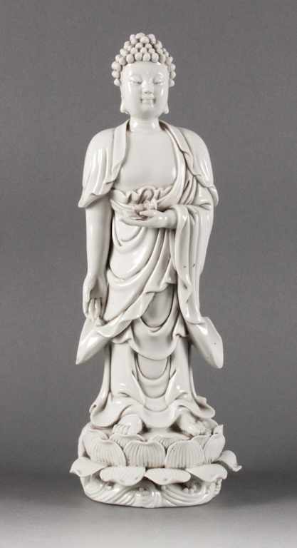 Appraisal: Japanese blanc-de-chine porcelain figure of Buddha standing on a lotus