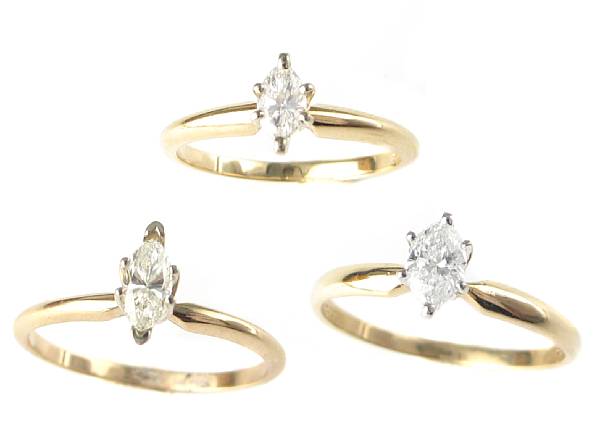 Appraisal: A set of three marquise diamond and k gold solitaire