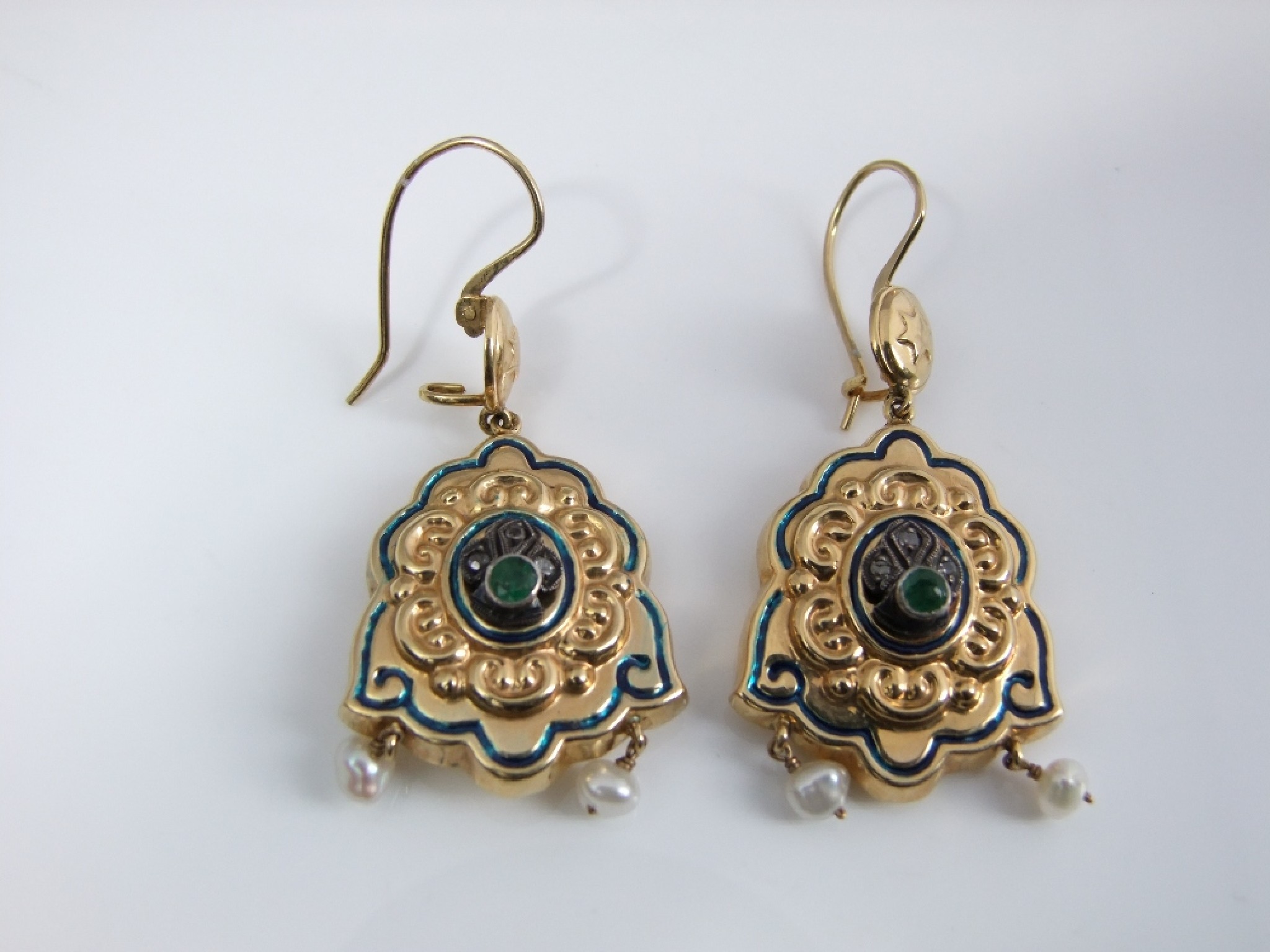 Appraisal: A pair of large embossed gold drop ear-rings diamond emerald