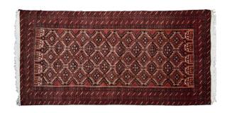 Appraisal: A BALUCHI RUG A BALUCHI RUG In the Turkish style