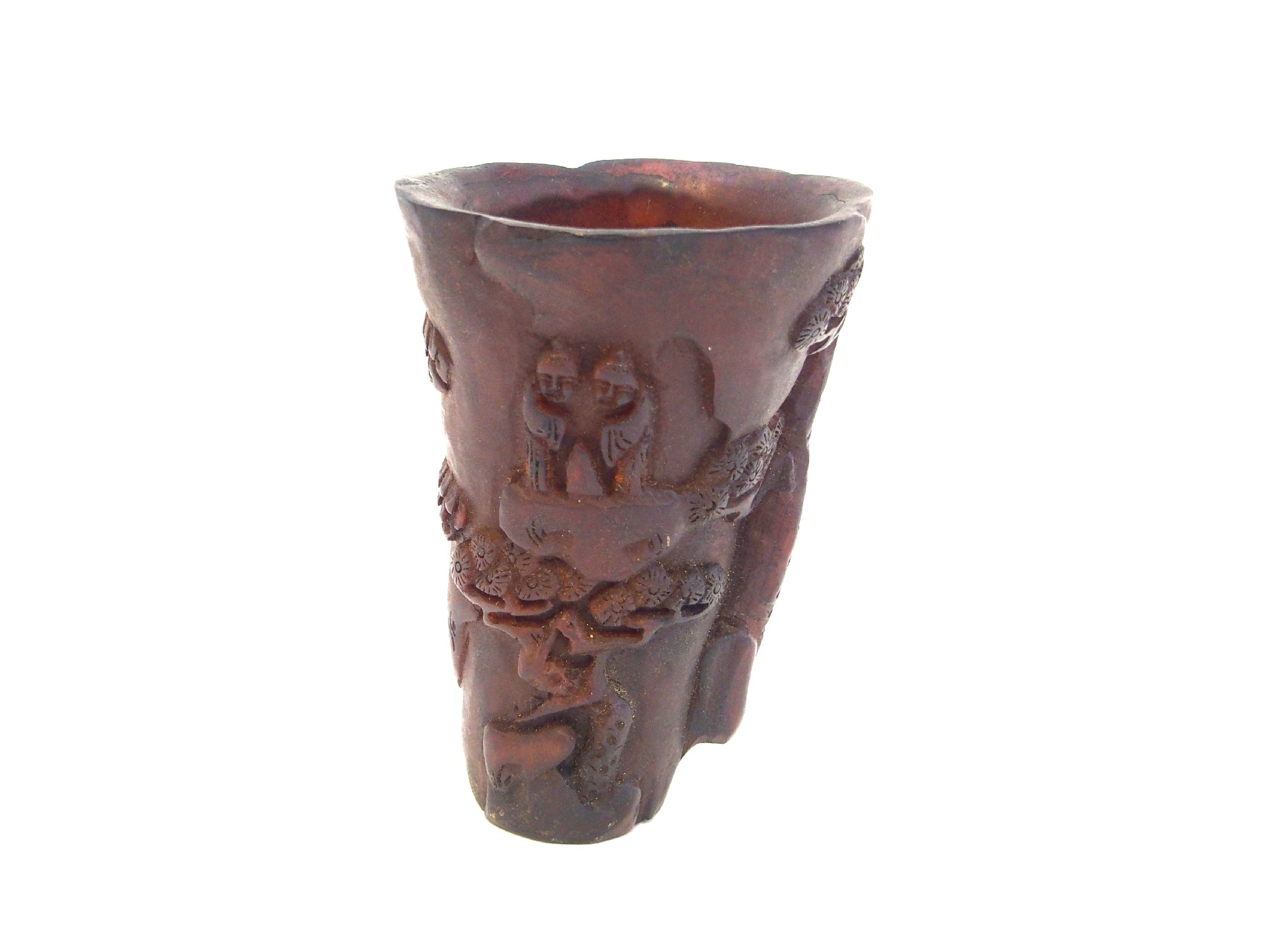 Appraisal: A Chinese libation cup carved with figures on rocks beneath