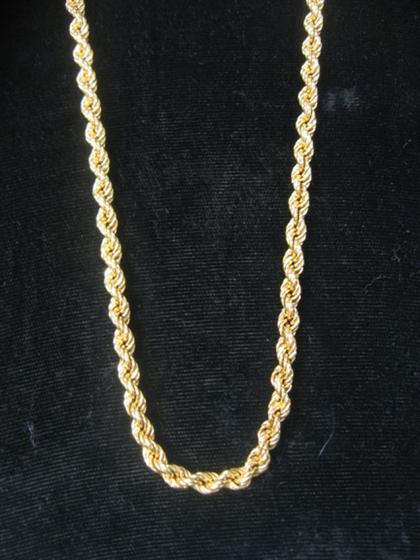 Appraisal: karat yellow gold rope style opera length necklace th century