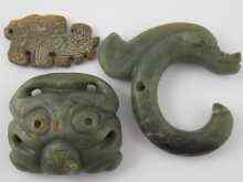 Appraisal: Three jade or hardstone pendants being a theatrical mask a