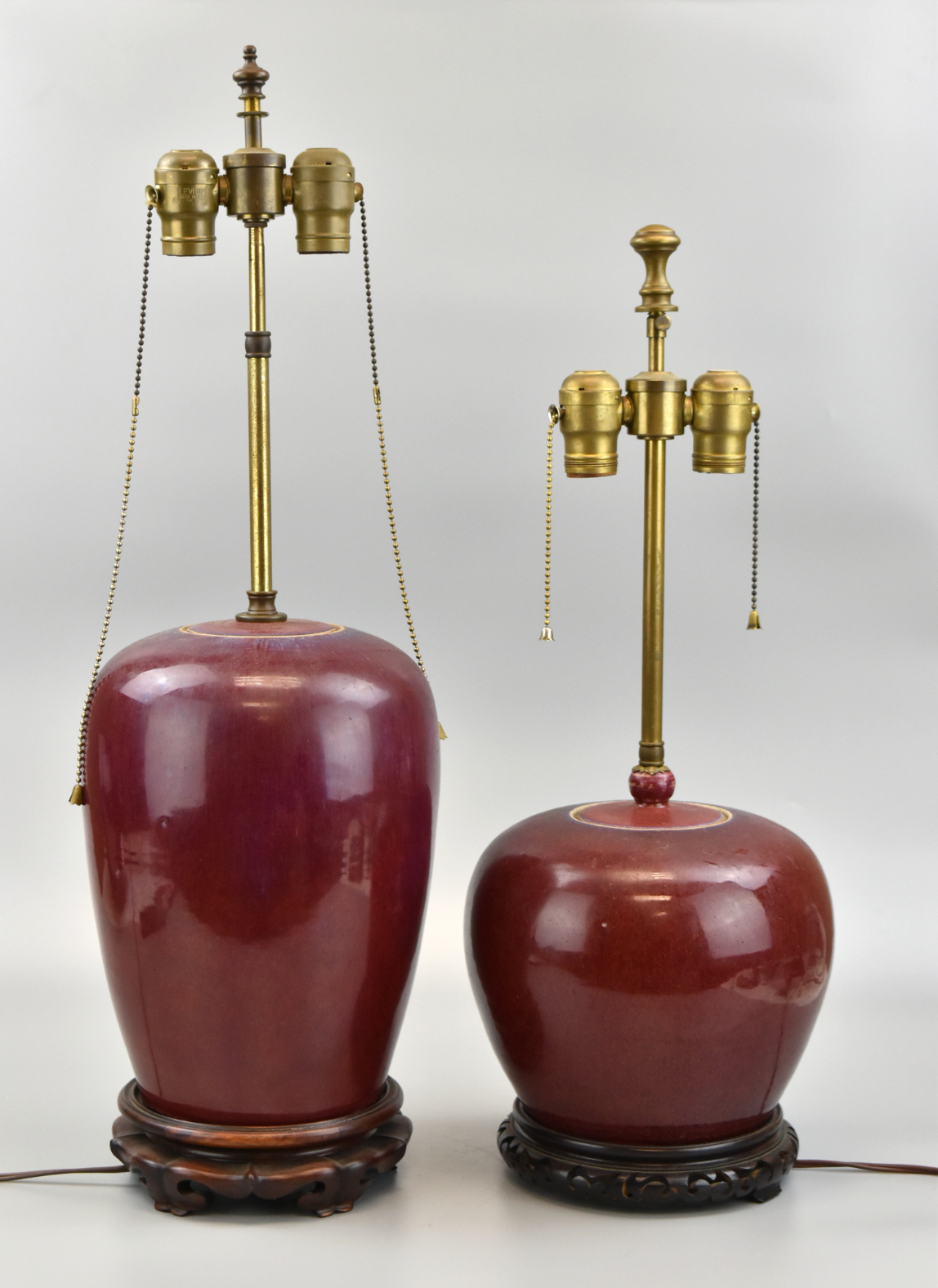 Appraisal: Two Chinese th C flambe glazed jars converted into lamps