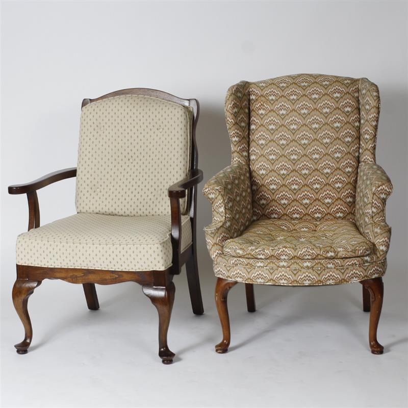 Appraisal: Two upholstered armchairs American antique wingback and later wood frame