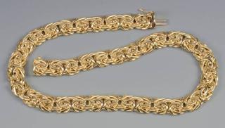 Appraisal: k Italian gold Etruscan link necklace One k yellow gold