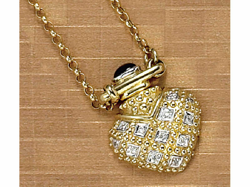 Appraisal: DIAMOND PENDANT k yellow gold pendant in form of bottle