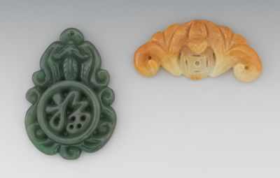 Appraisal: Two Carved Jadeite Ornaments Containing a butterscotch color ornament depicting