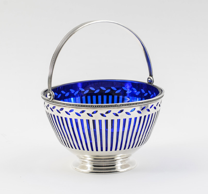 Appraisal: TIFFANY STERLING RETICULATED BASKET WITH INSERT Reticulated body hinged handle