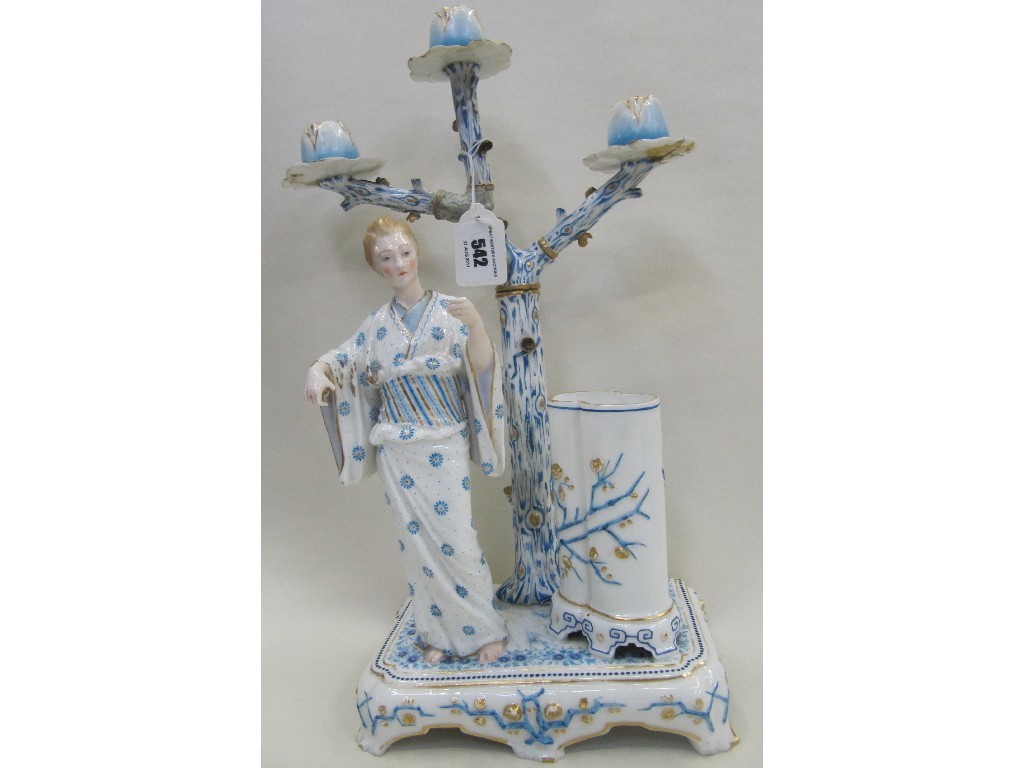 Appraisal: Victorian candelabra modelled as a woman in a kimono with