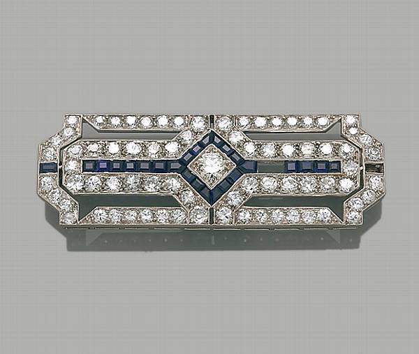 Appraisal: An art deco diamond sapphire and platinum brooch estimated total