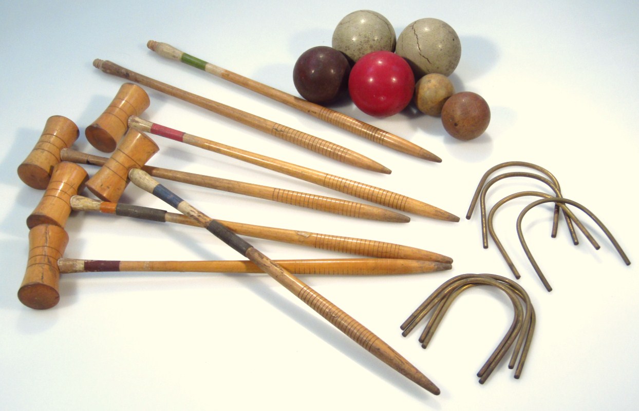 Appraisal: An early thC tabletop croquet set with polished mallets probably